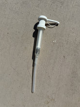 Load image into Gallery viewer, a gallon size dispenser on gray cement