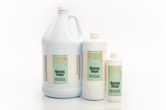 Cindra Moisturizing Dog Shampoo bottles for deep hydration in dry coats.
