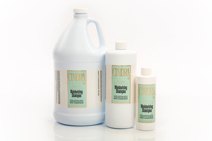Cindra Moisturizing Dog Shampoo bottles for deep hydration in dry coats.