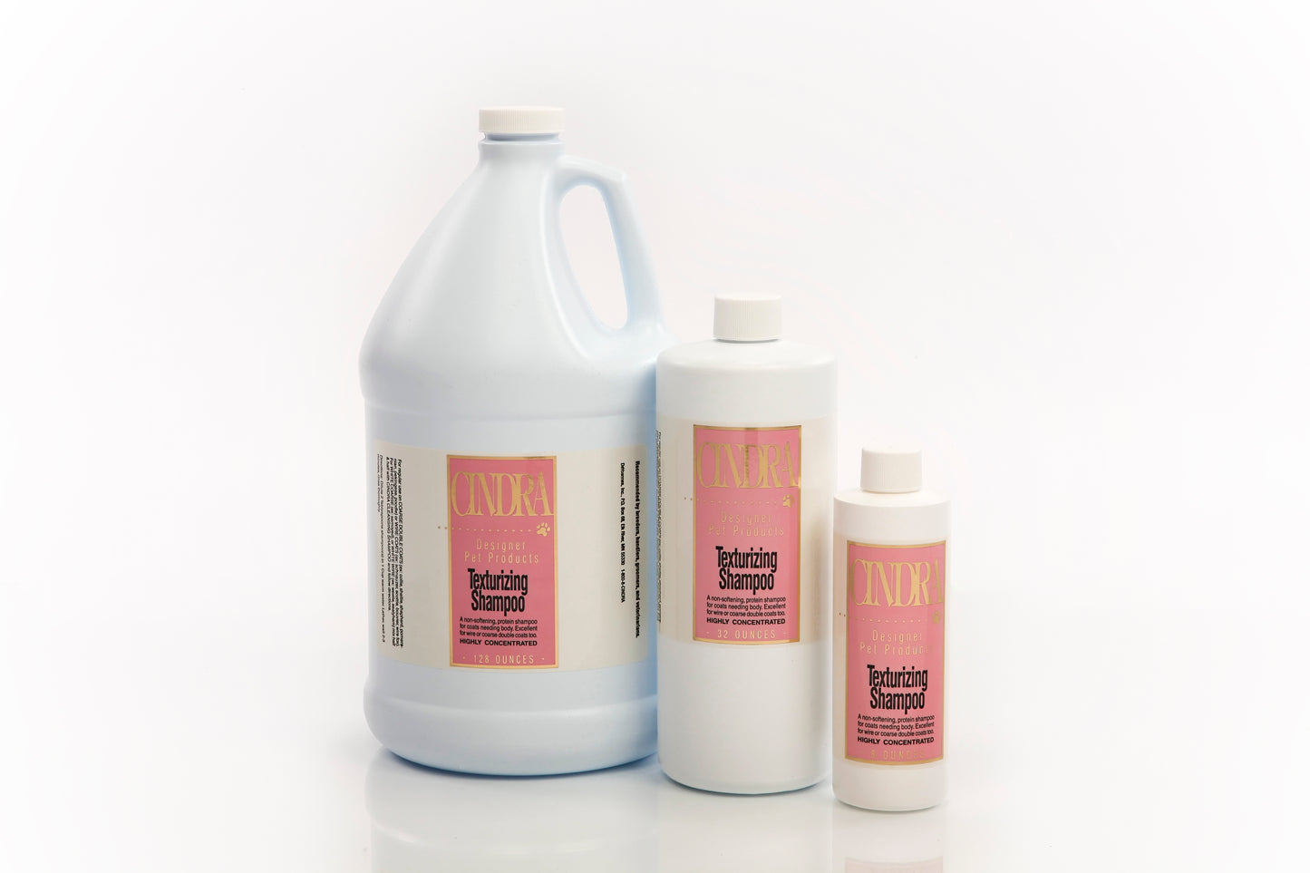 Cindra Texturizing dog shampoo bottles showcasing different sizes for professional grooming.